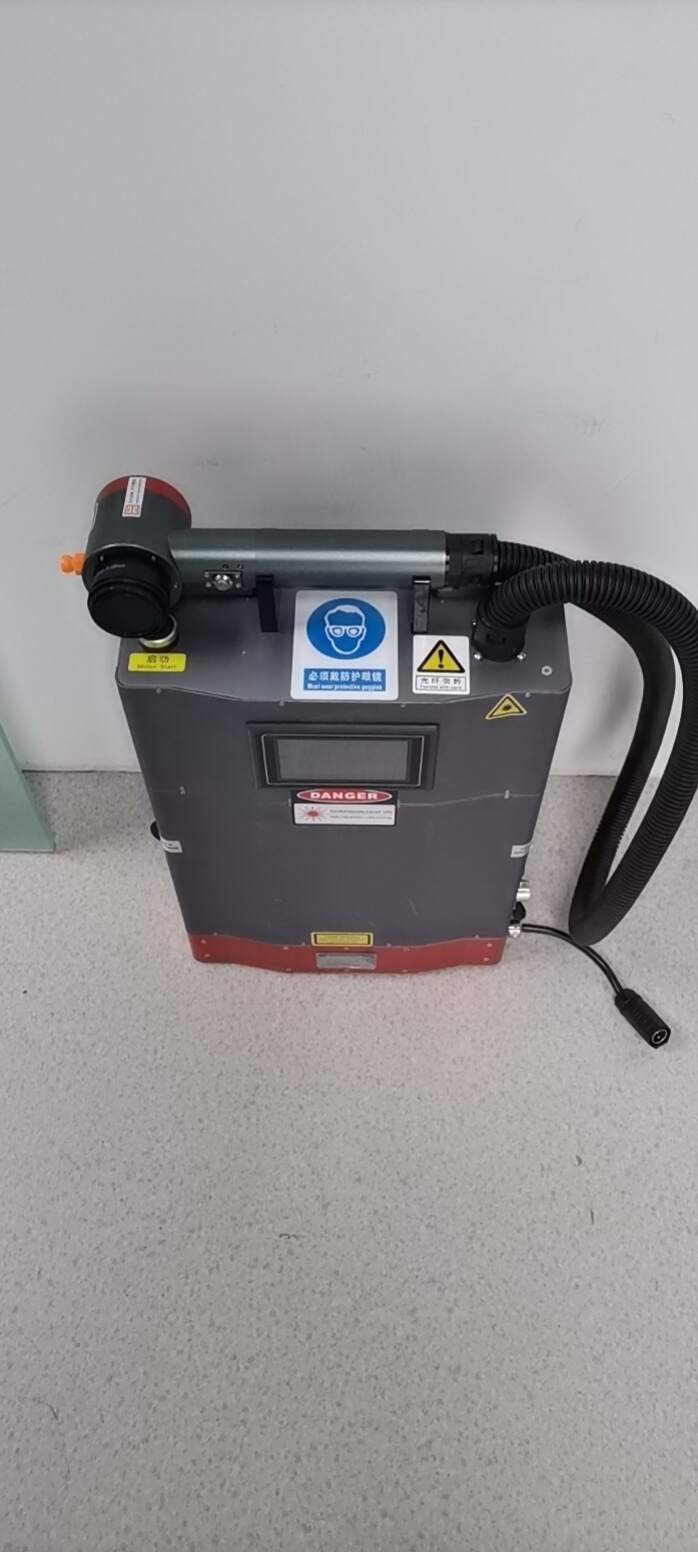 high tech handheld mini pulse fiber laser cleaning machine 100w for metal rust pain removal